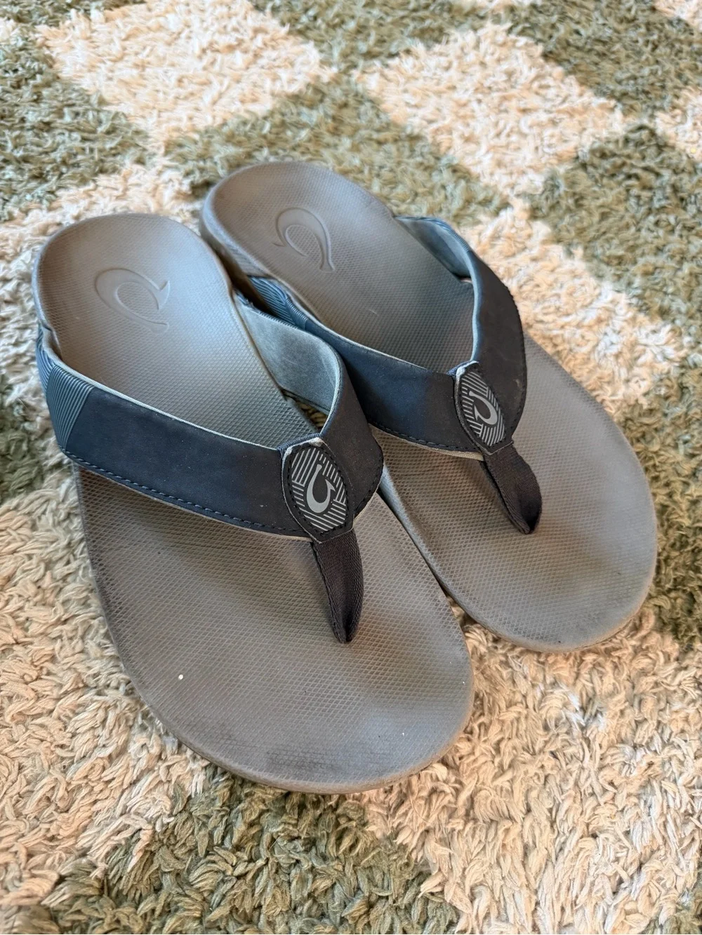 OluKai Gray and Black Thong Sandals